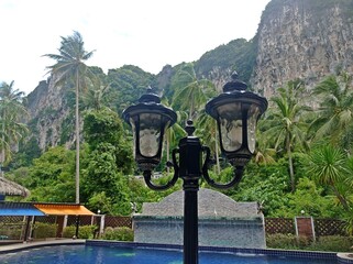 Wall Mural - Beautiful lamp in a resort with the background of mountains at Krabi Island, Thailand 