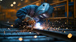 © Gun - worker doing welding work And a hat is worn to prevent sparks from flying into the eyes.