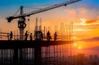 © Bijac - Construction site at sunset with silhouettes of cranes and workers Highlighting the progress and development of new buildings