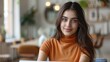 © HanThar Fusion - Young Indian female blogger influencer working on her laptop for social media in a fashion studio