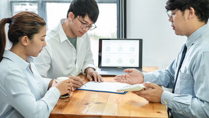 Poster - Asian couple signing on contract for investment after meeting with financial advisor for discussion new business