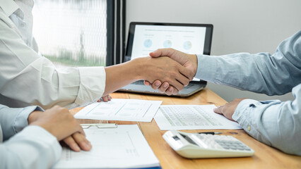 Poster - Asian couple shaking hands with financial advisor after consultation for investment of new business
