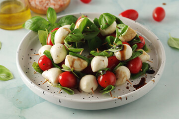 Wall Mural - A plate with Italian salad caprese canape	