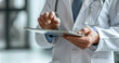 © kalafoto - doctor using tablet
