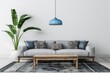 Minimalist Living Room with Grey Sofa and Blue Pendant Lighting
