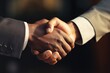 Close up shot of two people shaking hands. Suitable for business and teamwork concepts