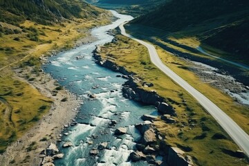 Poster - Scenic view of a river flowing through a beautiful green valley. Ideal for nature and landscape concepts