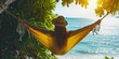 Happy traveler woman relax in hammock near the beach