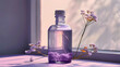 A small bottle with natural lavender oil on white table, blurred background
