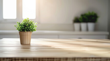 An empty wooden table that has been used as a product photo template, with a mini potted plant on top. The table is located in the middle of a minimalist kitchen space, with a clean and simple backgro