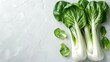 Organic fresh bok choy or pak choy in a white surface with a big space for text or product and a top view, Generative AI.