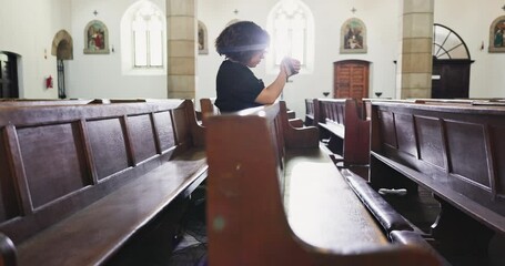 Wall Mural - Woman, sad and praying at church with respect, alone and religion for grief with comfort, gratitude and confess. Hope, spiritual and trust with support before memorial service or wake for funeral