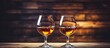 Intimate Whiskey Evening: Two Glasses of Brandy on a Rustic Wooden Table