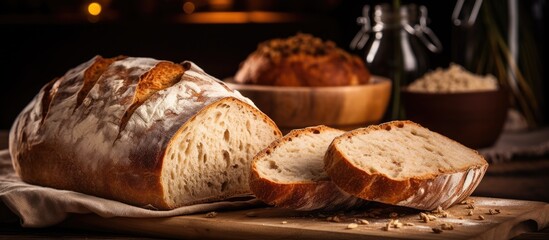 Sticker - Rustic Loaf of Bread Resting on a Wooden Cutting Board in a Baker's Kitchen