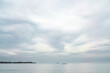 © Manu Prats - Soft Sky and Calm Sea with Distant Boats, Gili Island, Indonesia, Asia