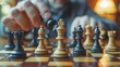 © Dita - close-up of a hand moving a king piece on a chessboard, highlighting the decisive moments of a strategic game