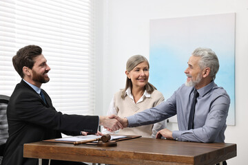 Wall Mural - Senior couple having meeting with lawyer in office