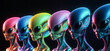 A row of six colorful aliens with large black eyes on a black background. 