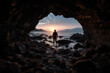 Explorer Standing in Cave Gateway to Sunset