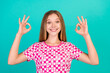 © deagreez - Photo portrait of lovely teen lady show excited double v-sign wear trendy print pink garment isolated on cyan color background