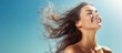 Ethereal Beauty: Graceful Woman with Flowing Long Hair Caught in the Wind