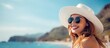 Stylish Woman Enjoying Sunny Day at Tropical Beach with Trendy Hat and Sunglasses