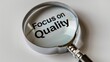 Symbolizing Quality Assurance, Magnifying Glass Focused on Focus on Quality Phrase Against White Background