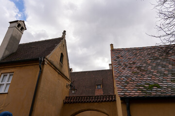 Wall Mural - A brown building with a chimney and a roof