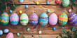 colorful painted easter eggs on a wooden table, gold green orange blue easter eggs on wood background. Easter frame of eggs painted in blue colorful color. Flat lay, top view. Copy space for tex