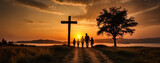 Fototapeta Konie - Silhouette of a family of parents and children walking together along a path towards a majestic wooden cross during a warm, orange sunset.