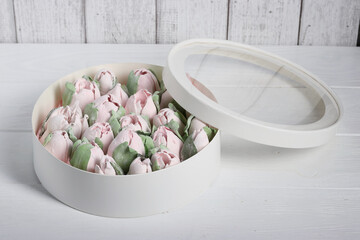 Wall Mural - Marshmallow flowers. Marshmallows in hatboxes. Homemade marshmallows. A white hatbox. The box is open.