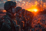 Fototapeta  - Soldiers stand in a line facing a spectacular sunset, evoking a contemplative and solemn mood