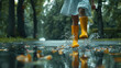 ©   Vladimir M. - A girl in rubber boots runs through puddles.