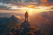 © lublubachka - A man stands confidently on the summit of a mountain as the sun sets in the background, casting a warm golden glow over the rugged landscape