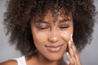 © Mapodile/peopleimages.com - African woman, beauty and skincare cream with smile, wellness or afro in home bathroom for morning routine. Girl, person and serum with cosmetics, touch or transformation with self care in apartment