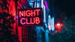 selective focus of a neon lights sign of a night club - prostitution and night club concept