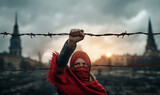 Fototapeta Góry - Standing against oppression concept with masked woman grabbing barbwire, opposition and standing up against tyranny