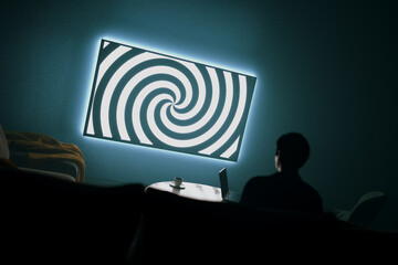 Dark room with a person watching TV with a mesmerizing spiral - manipulation