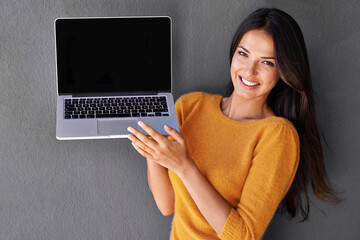 Poster - Woman, portrait and laptop screen in studio, empty and mockup space for website or app. Female person, communication and blank display for marketing or advertising, social media and gray background