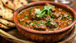 nihari stew served with naan bread