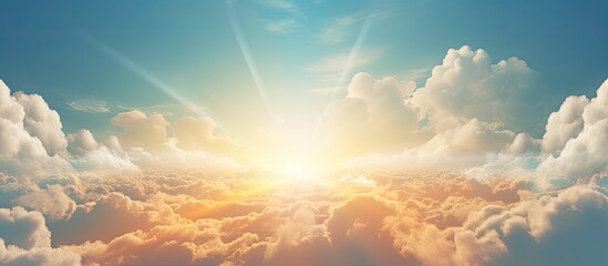 Wall Mural - Radiant Sun Bursting Through Ethereal Clouds on a Turquoise Sky Background