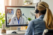 A telemedicine doctor consults with a patient via video call, providing medical advice, diagnosis, and prescriptions remotely, ensuring accessible healthcare.