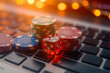 Stack of casino chips and dice lie on a laptop keyboard. Generative AI