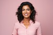 © Iigo - Portrait of happy smiling young business woman in pink shirt, over pink background