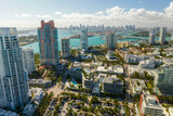 Fototapeta Mapy - American southern architecture of Miami Beach. South Beach high luxurious hotels and apartment buildings. Tourist infrastructure in southern Florida, USA