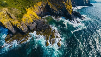 Wall Mural - Aerial view of sea waves and fantastic Rocky coast. Summer seascape from drone. Travel concept	