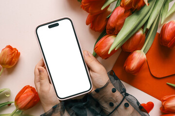 Wall Mural - Girl with a phone in her hands with an isolated screen on a background of flowers