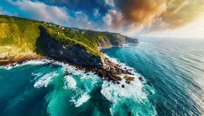 Wall Mural - Aerial view of sea waves and fantastic Rocky coast. Summer seascape from drone. Travel concept.