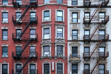 Wall Mural - New York City ornate old apartment buildings with external fire ladders