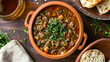 saltah stew served with bread for dipping